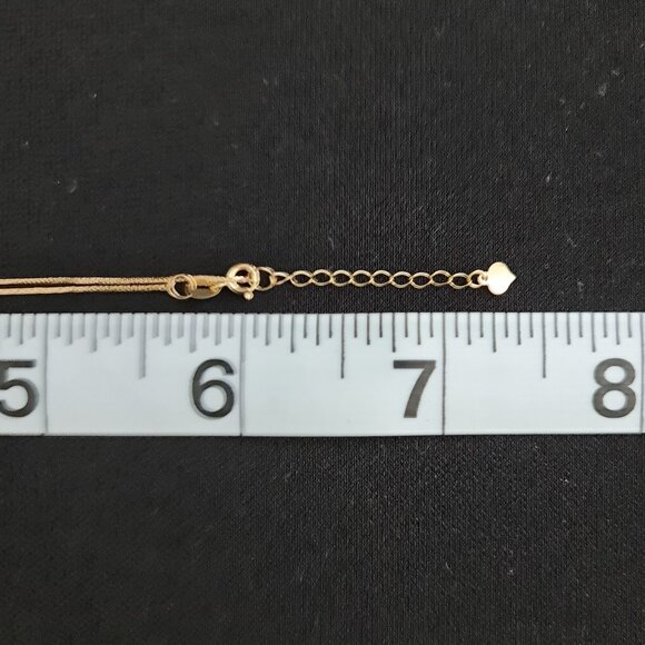 18k Bracelet with small balls and cute money catcher design as charm - Picture 13 of 16